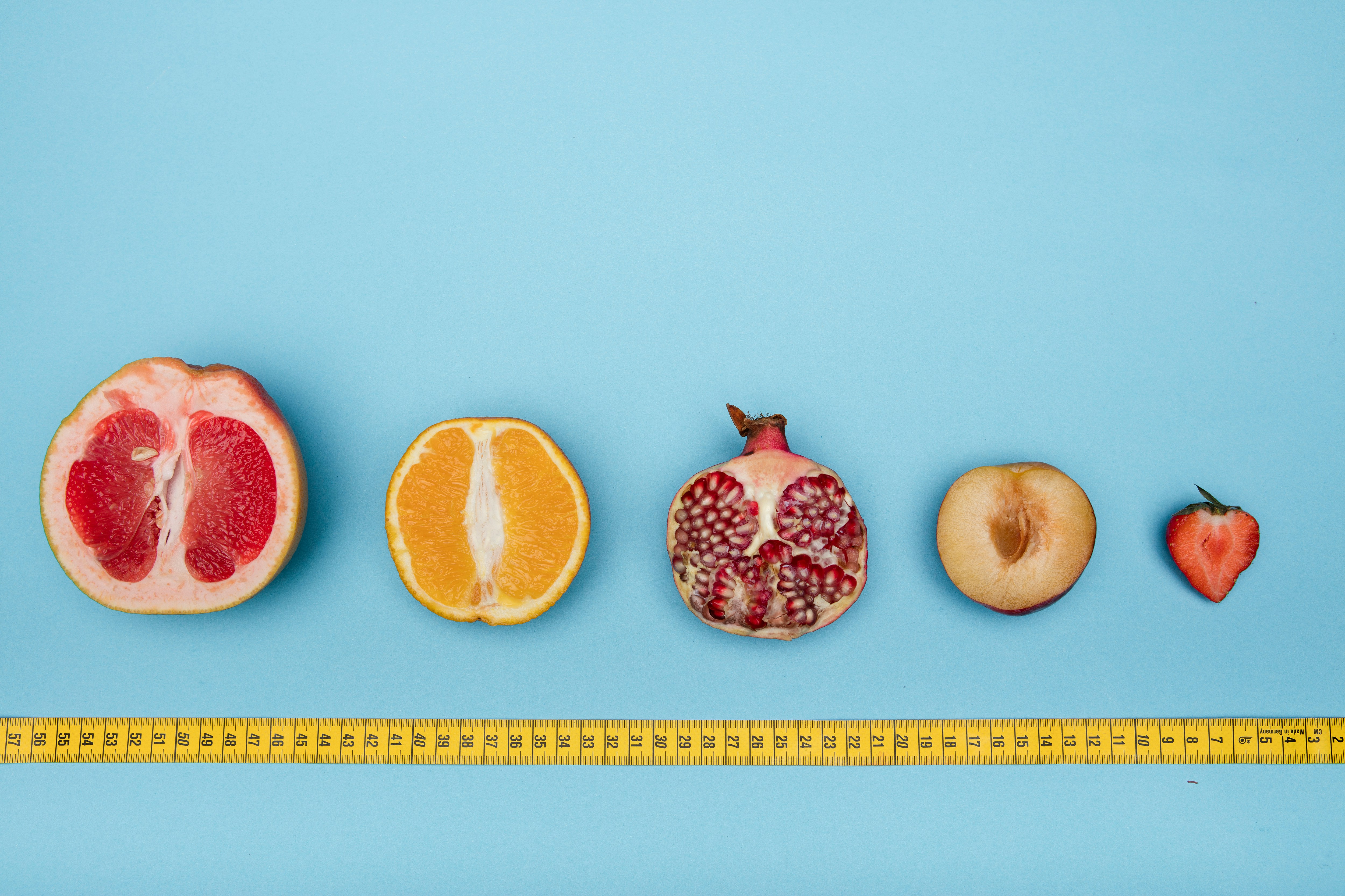sliced orange fruit and orange fruit