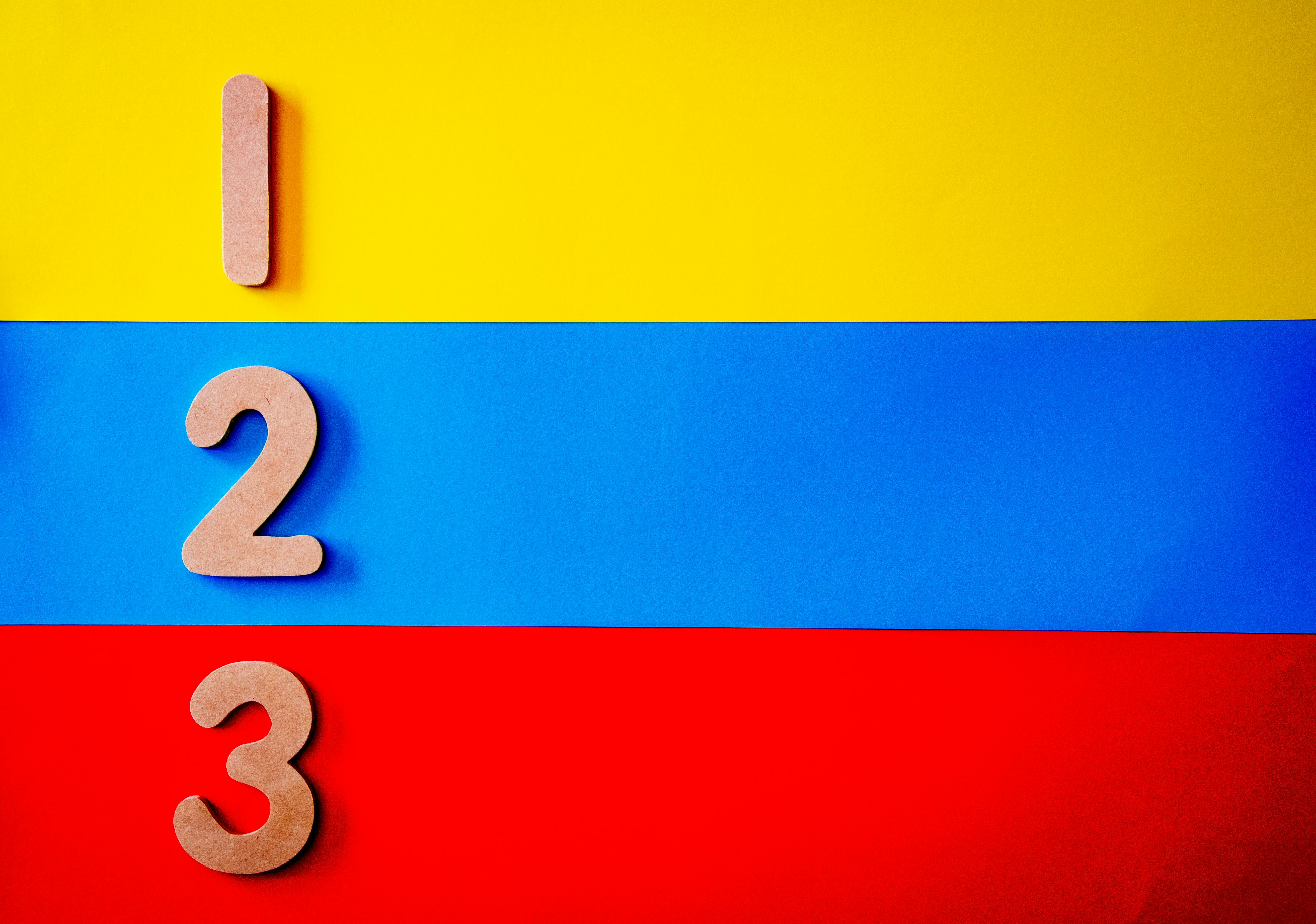 Vibrant image of numbers one, two, and three against a primary color background.